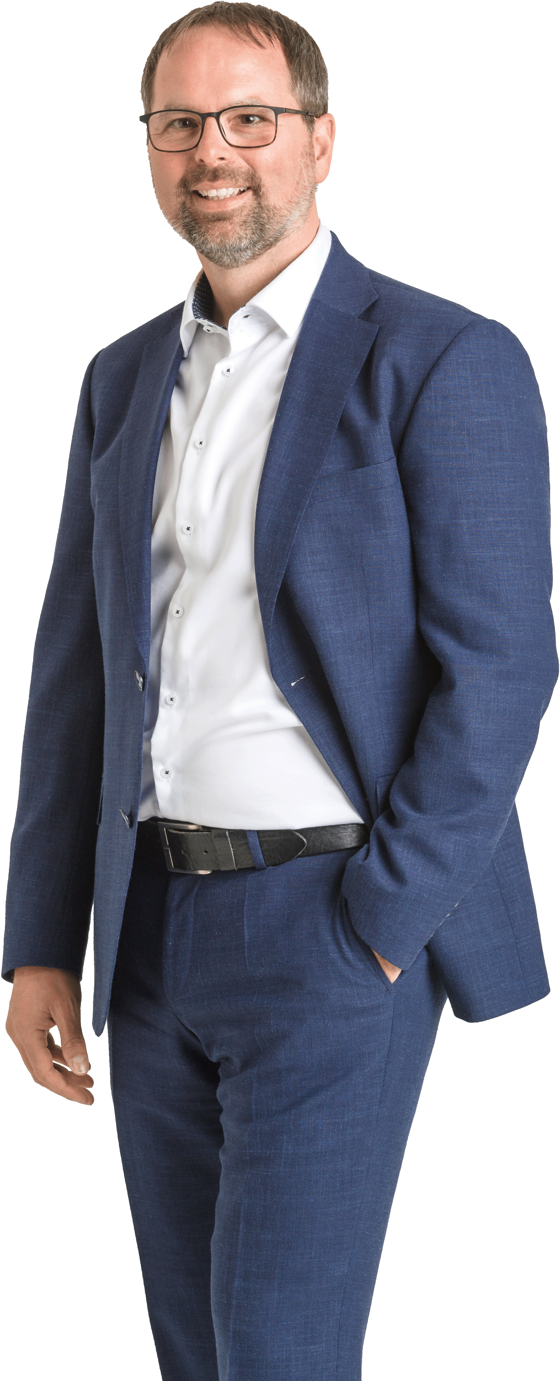 Großes Bild von Andreas Magg mit Brille, Hemd und Jeans